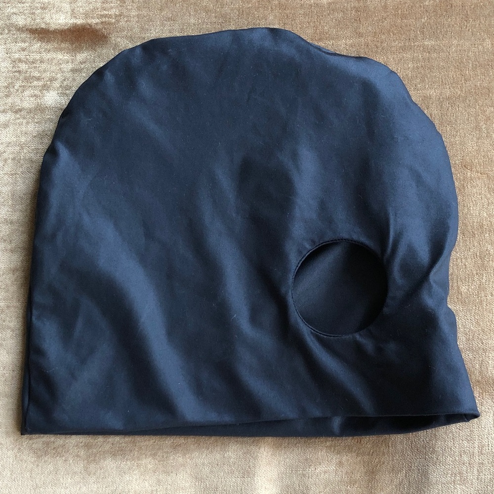 Designer Scull hat with open whole as a detail. May be pony tail. Small Size 21”